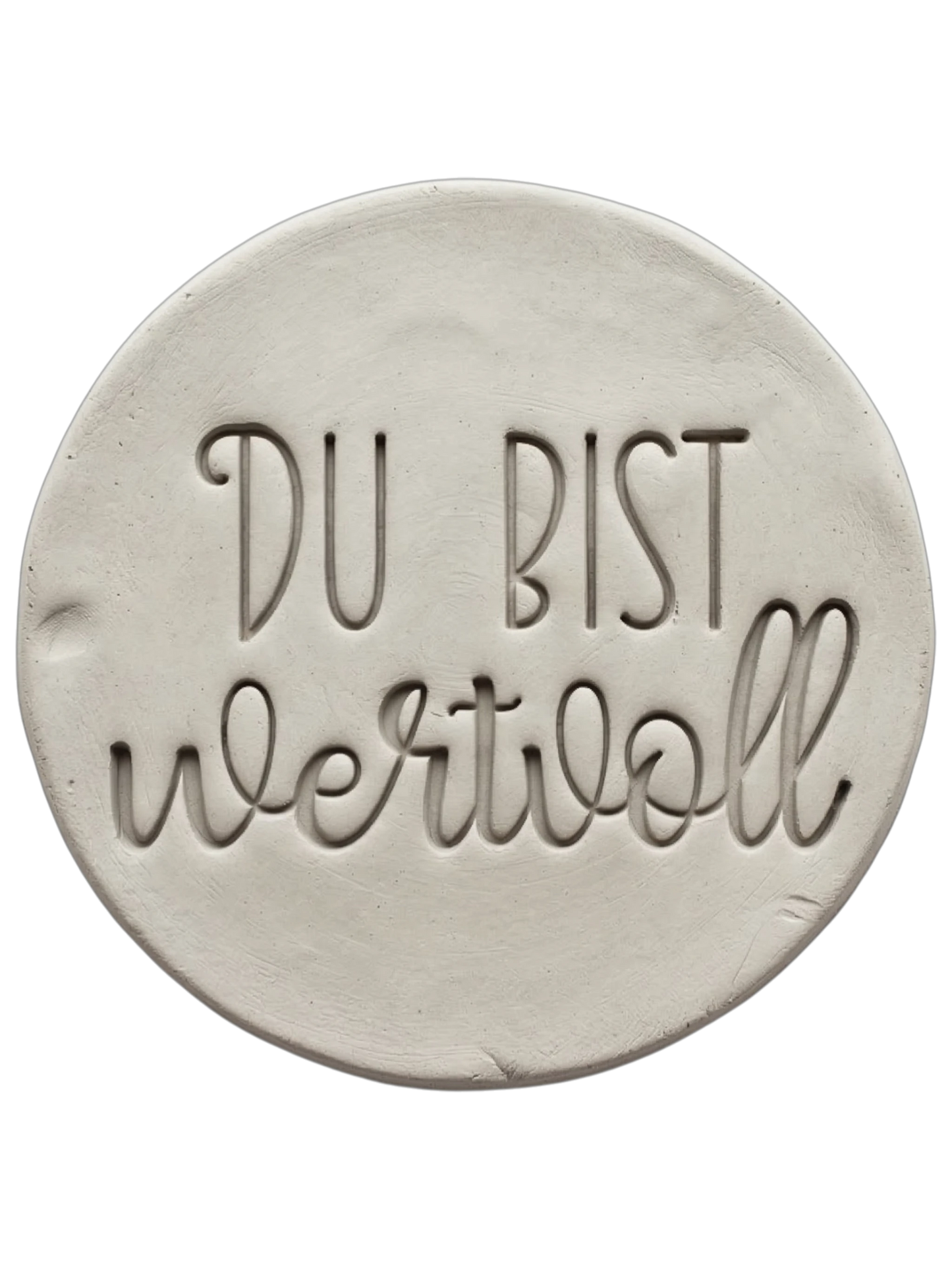 Sauberer Stempelabdruck im hellen Ton mit dem Schriftzug 'DU BIST wertvoll'. Kombination aus moderner Druckschrift und eleganter Schreibschrift, erstellt mit einem MinseArt Keramikstempel.