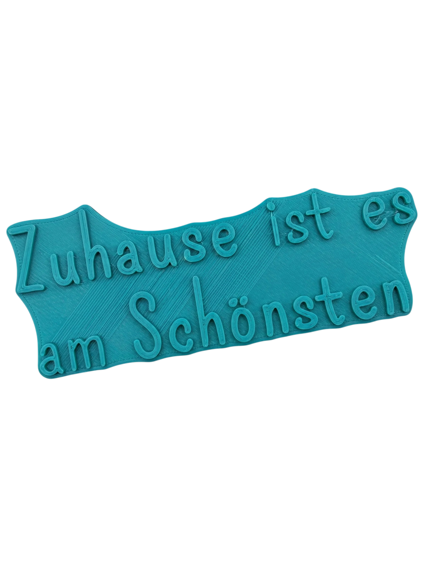 Türkisfarbener Keramikstempel Zuhause ist es am Schönsten. Hochwertiger Töpferbedarf für klare und saubere Textprägungen in Ton und lufttrocknenden Massen.