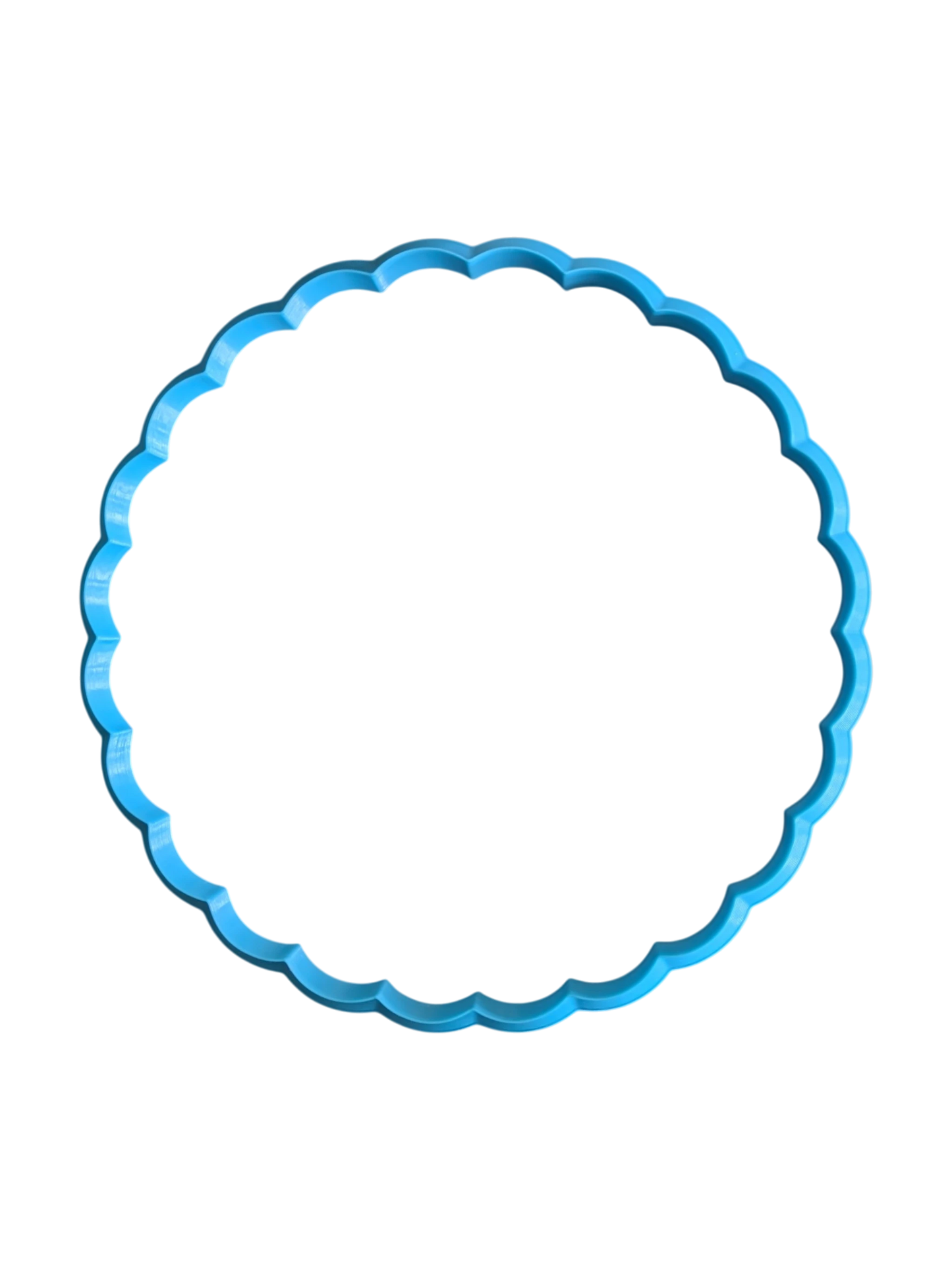 Draufsicht auf den türkisfarbenen Ausstecher in Blumenform. Hochwertiges Töpferwerkzeug aus stabilem Material, ideal für dekorative florale Untersetzer und Schälchen aus Ton.