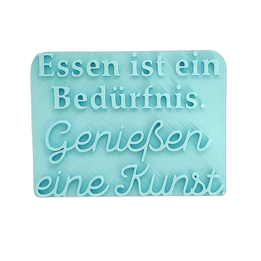 Essen ist ein Bedürfnis. Genießen eine Kunst. - Stempel - Spruchstempel