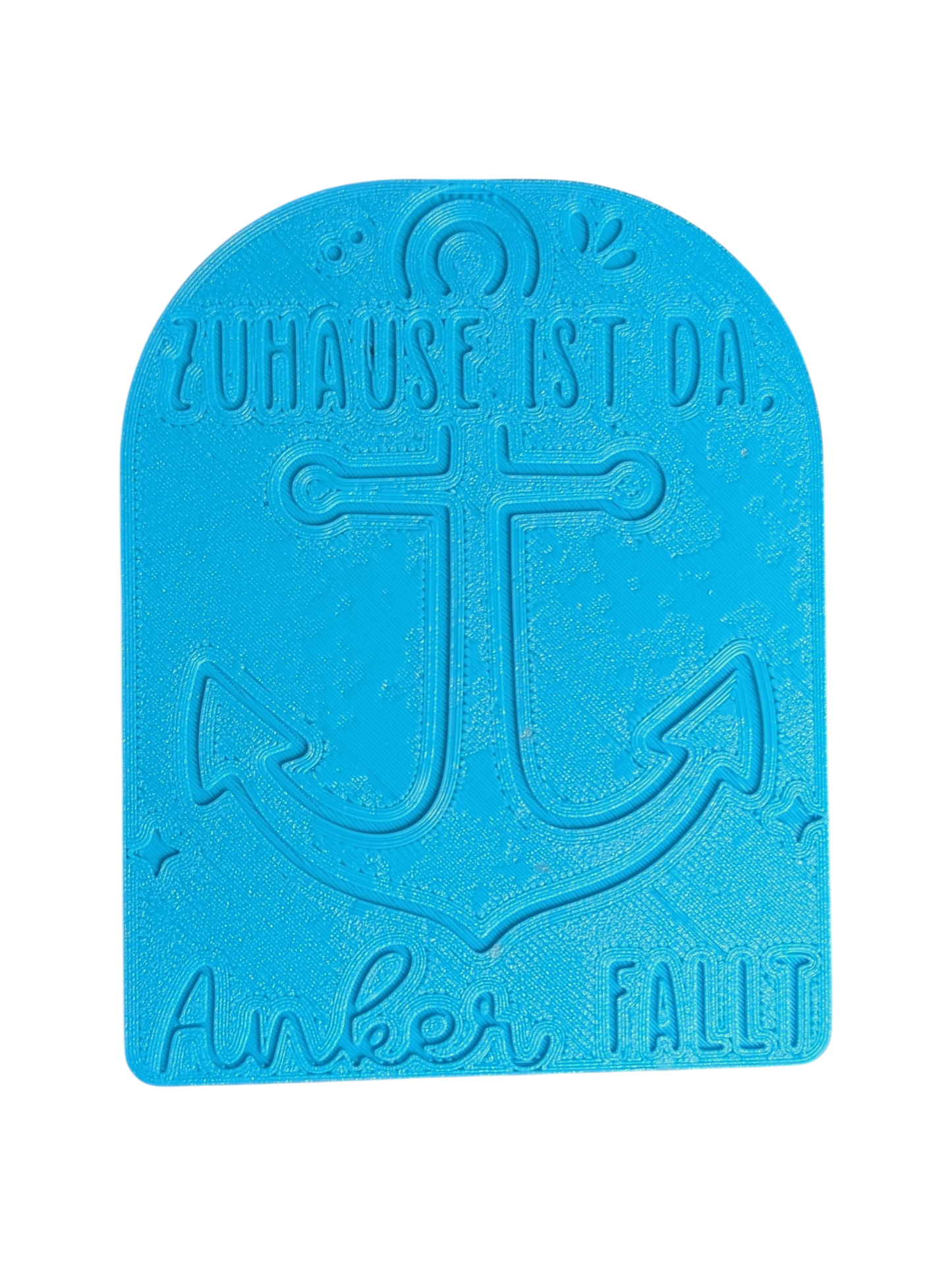 Draufsicht auf die Positionierungshilfe des Tonstempels 'Zuhause ist da, wo der Anker fällt'. Der detailreiche Keramikstempel verfügt über eine Positionierungshilfe für exaktes Arbeiten.
