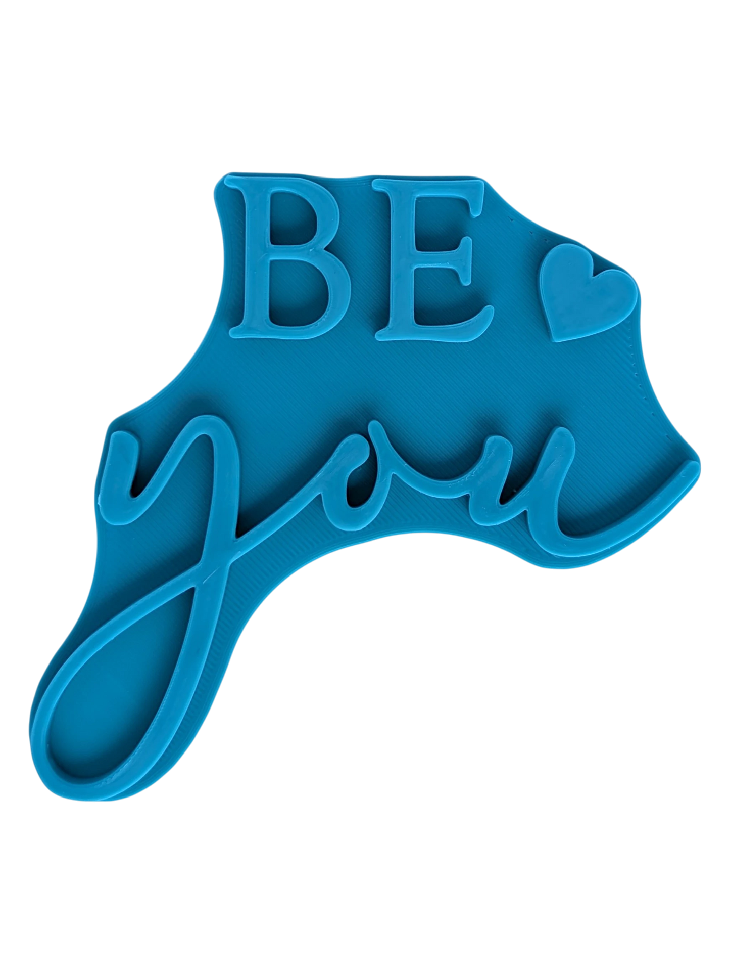 Blaugrüner Textstempel für Ton mit dem Schriftzug 'BE you' und einem kleinen Herz. Gestalte saubere, motivierende Prägungen in Keramik und Ton.
