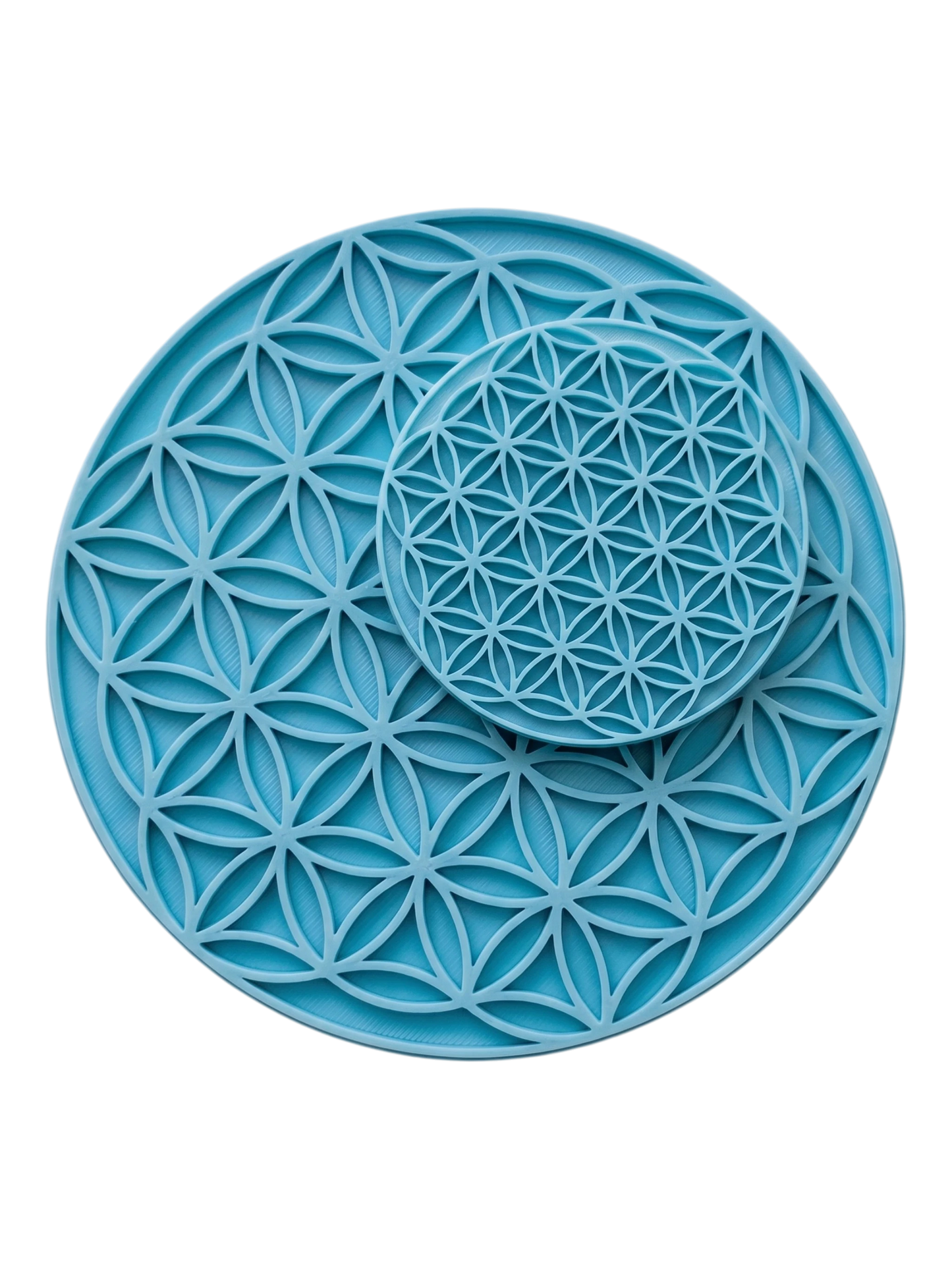 Zwei Blume des Lebens Keramikstempel in unterschiedlichen Größen im Vergleich. Zeigt die detailreiche Verarbeitung des Mandala-Musters.