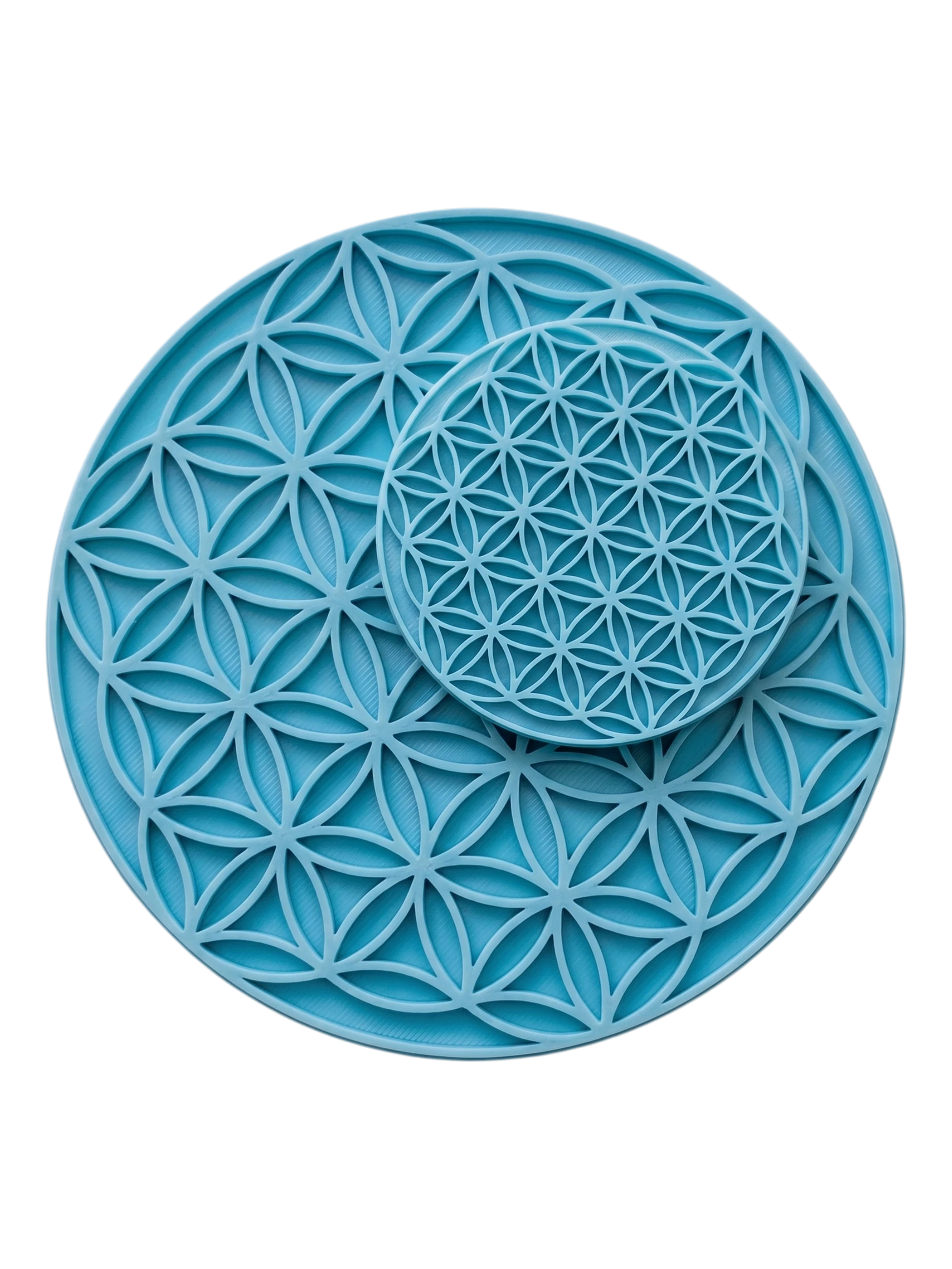 Zwei Blume des Lebens Keramikstempel in unterschiedlichen Größen im Vergleich. Zeigt die detailreiche Verarbeitung des Mandala-Musters.