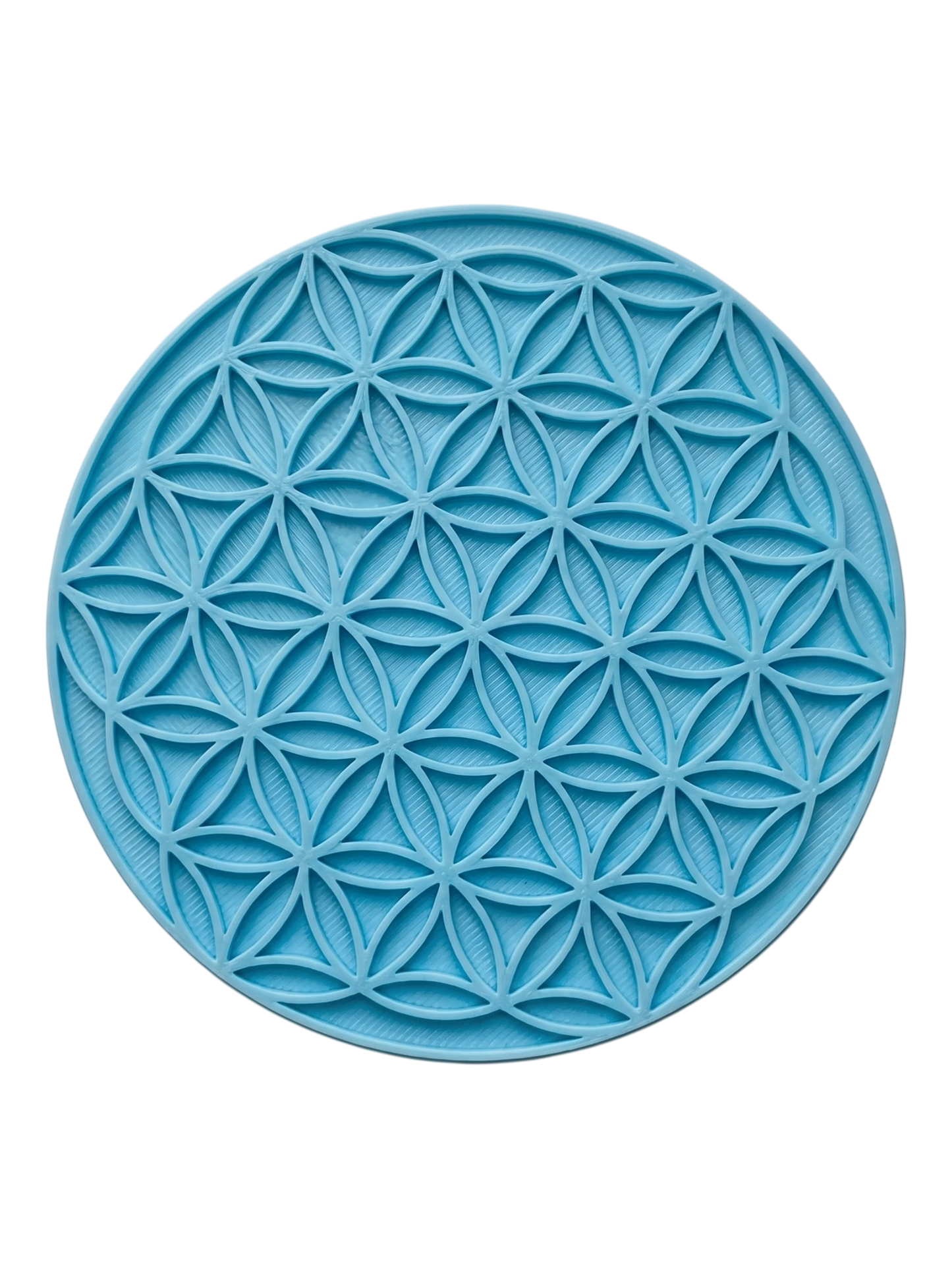 Blaugrüner Keramikstempel mit dem heiligen Geometrie-Muster 'Blume des Lebens'. Ideal für großflächige, präzise Prägungen in Ton und Keramik.