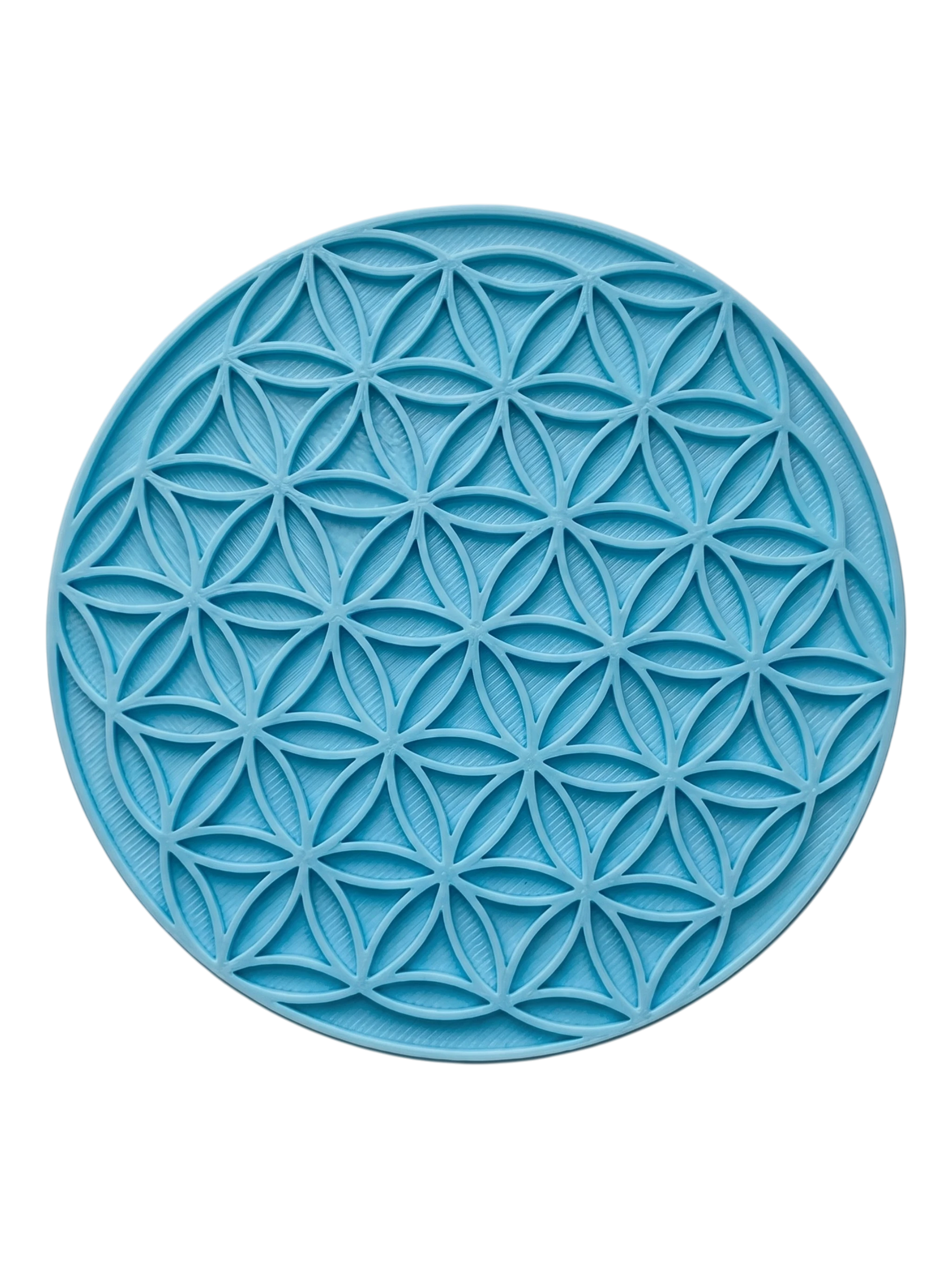 Blaugrüner Keramikstempel mit dem heiligen Geometrie-Muster 'Blume des Lebens'. Ideal für großflächige, präzise Prägungen in Ton und Keramik.