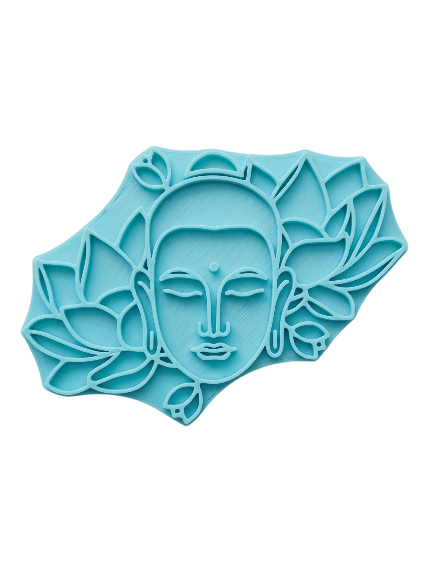 Blaugrüner Keramikstempel mit Buddha-Gesicht und Lotusblüten. Detailreiches Töpferwerkzeug für saubere, künstlerische Prägungen in Ton.