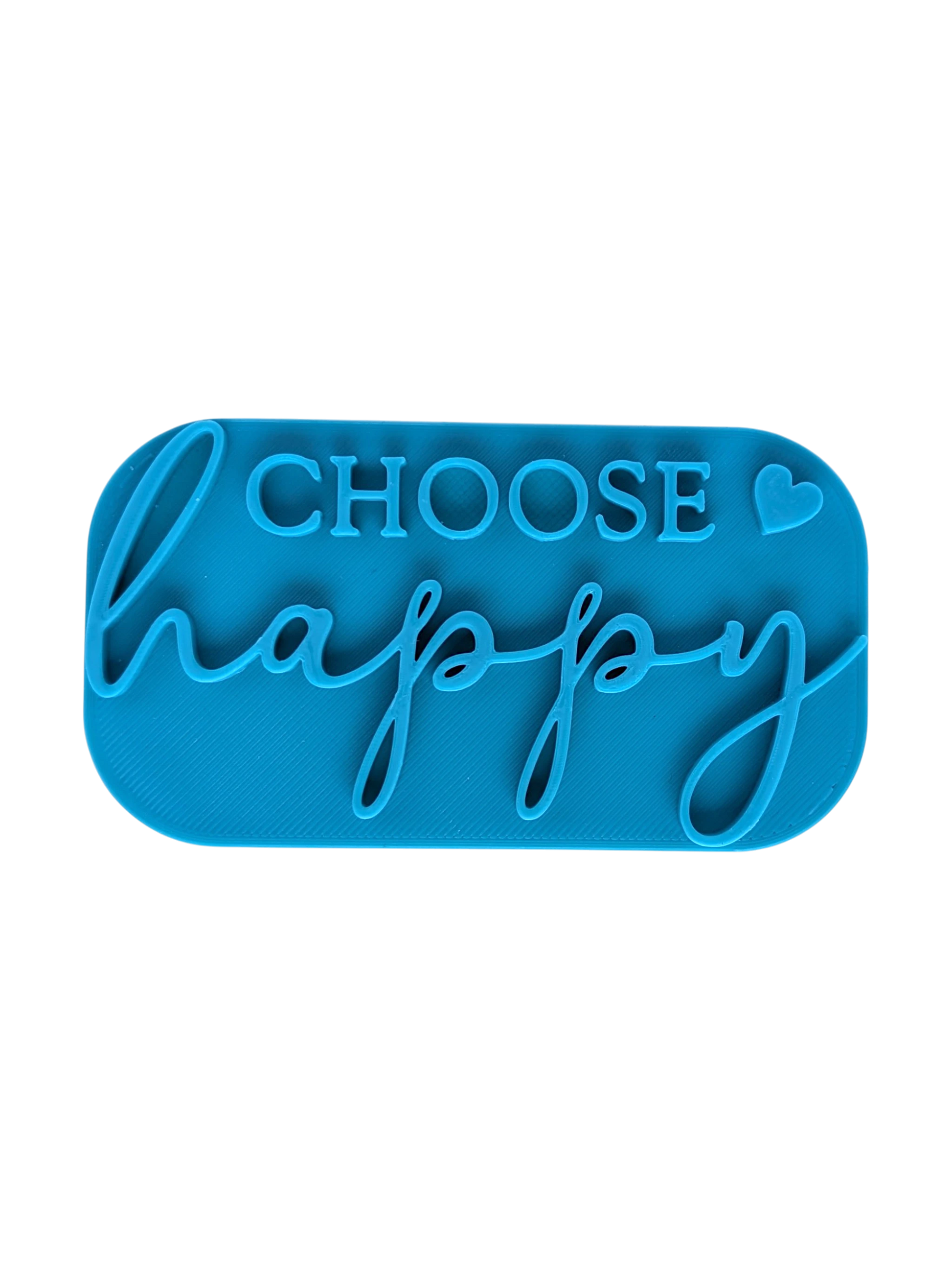 Blaugrüner Textstempel für Ton mit dem Schriftzug 'Choose happy' und einem kleinen Herz. Gestalte saubere Prägungen in Keramik und Ton für mehr gute Laune.