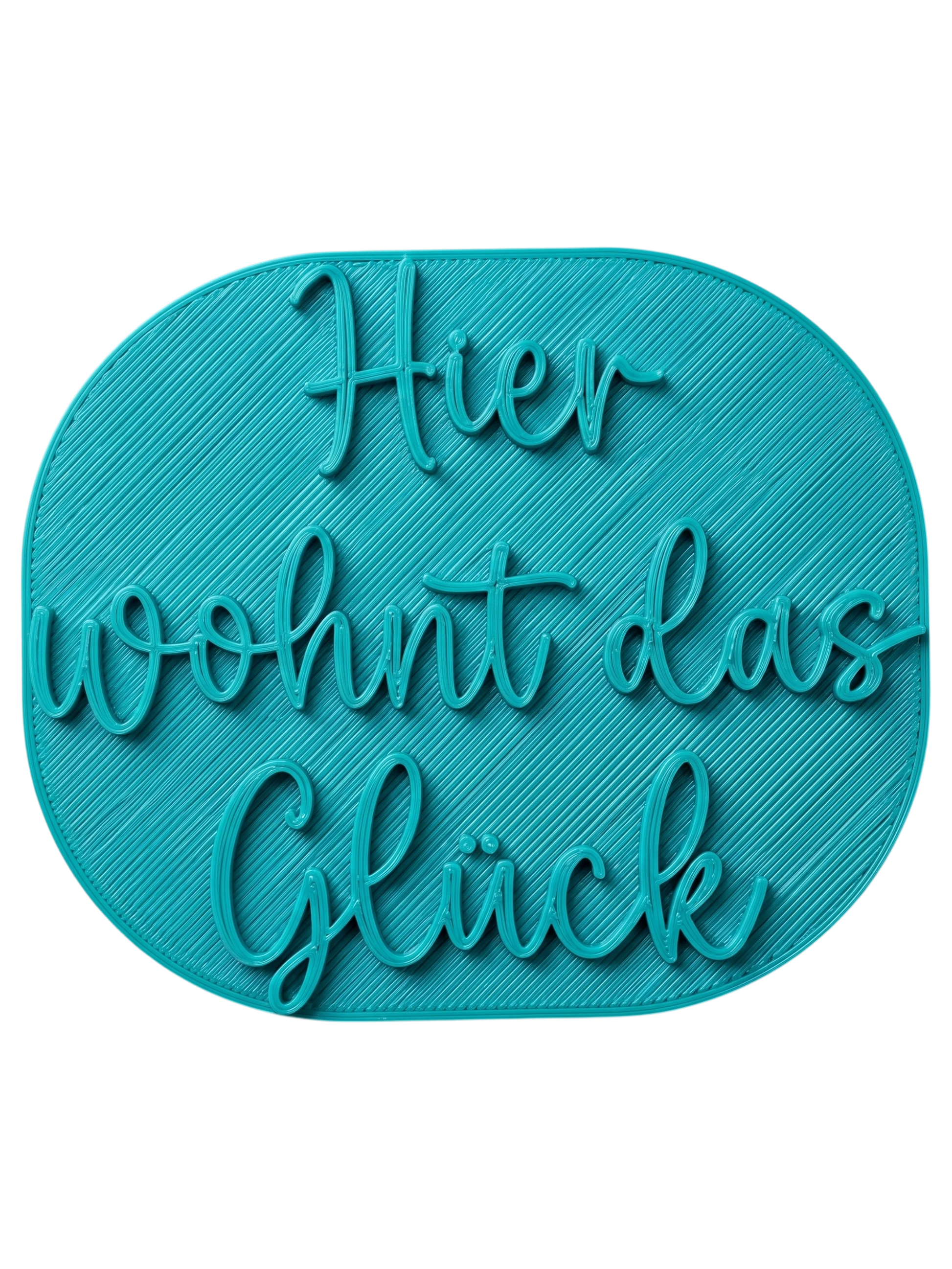 Präziser Stempelabdruck 'Hier wohnt das Glück' in hellem Ton. Das tiefe Relief der modernen Handschrift auf der runden Tonplatte zeigt die feinen Konturen des MinseArt Textstempels.