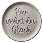Türkisfarbener Keramikstempel für Ton mit der Aufschrift 'Hier wohnt das Glück' in eleganter Schreibschrift. Hochwertiges Töpferwerkzeug von MinseArt für saubere Textprägungen.
