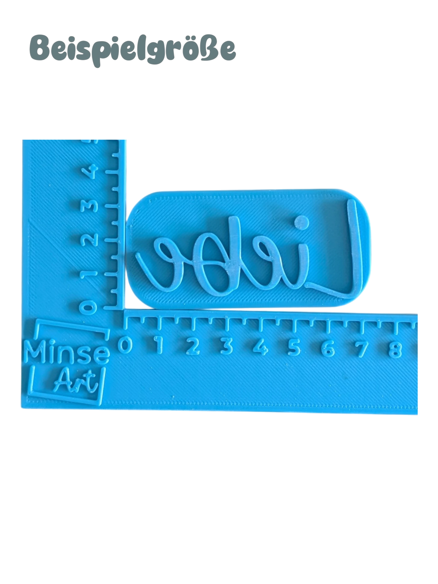 Blauer Keramikstempel mit dem Schriftzug Liebe im blauen Winkel-Messinstrument (in cm) zur Darstellung der Größenoptionen von 7 cm und 10 cm.