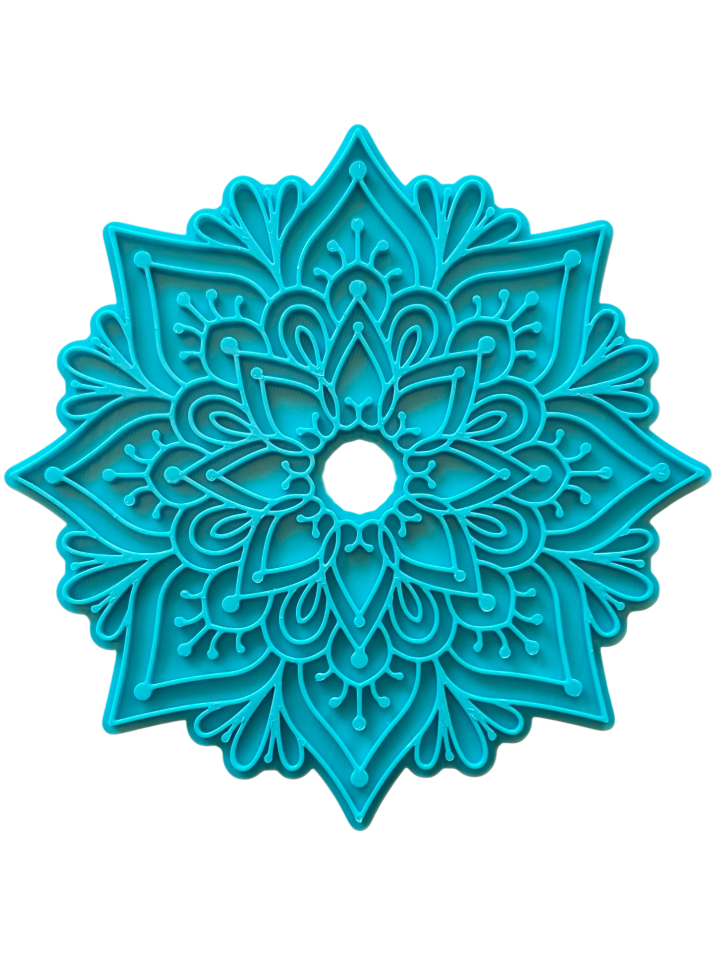 Türkisfarbener Keramikstempel für Ton mit dem floralen Muster Mandala Nalini. Ein detailreicher Motivstempel und wunderschönes Töpferwerkzeug für symmetrische Verzierungen.
