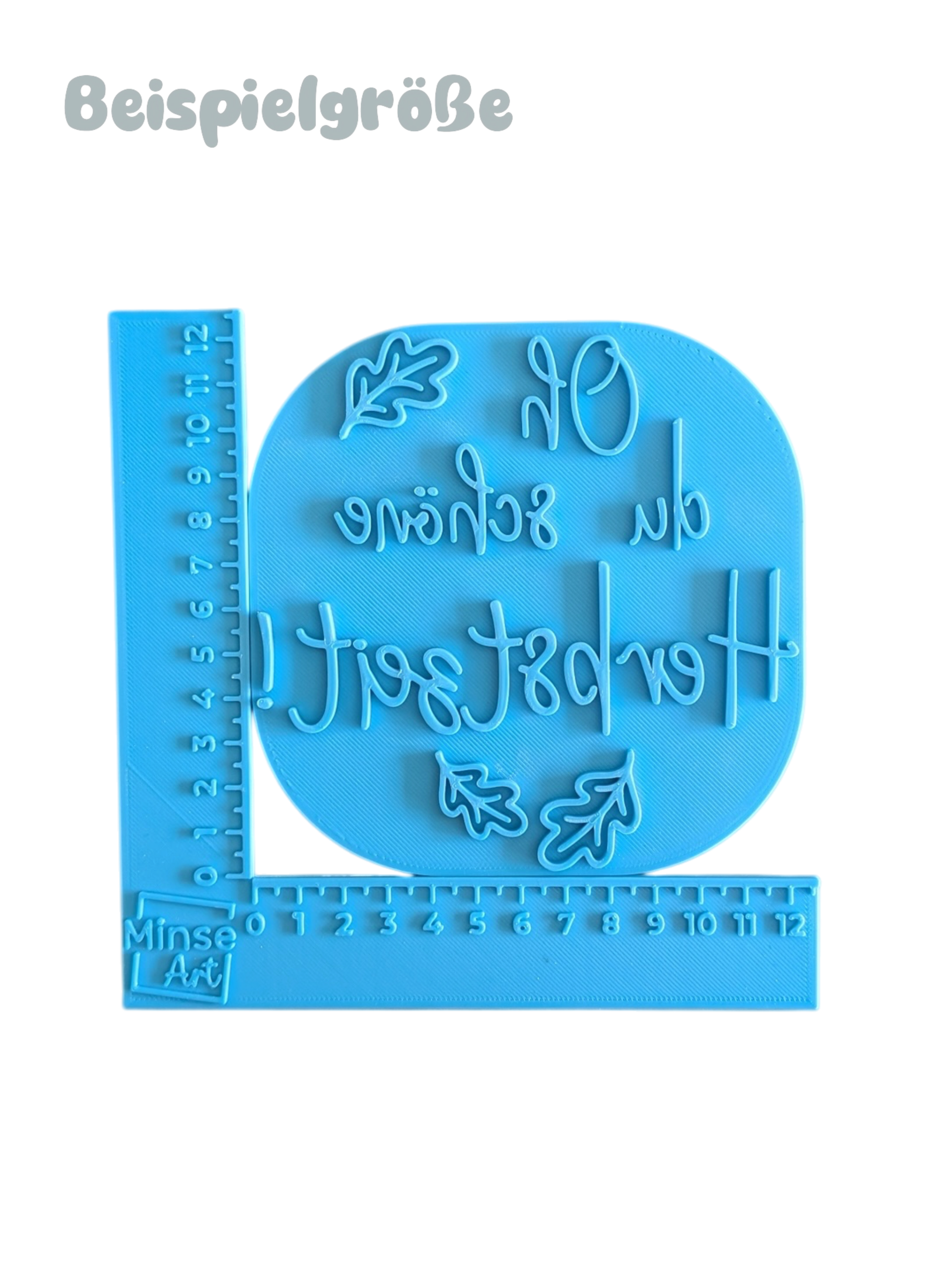 Blauer Keramikstempel mit dem Spruch Oh du schöne Herbstzeit im Winkel-Messinstrument zur Darstellung der Größen 12, 15 und 17 cm.
