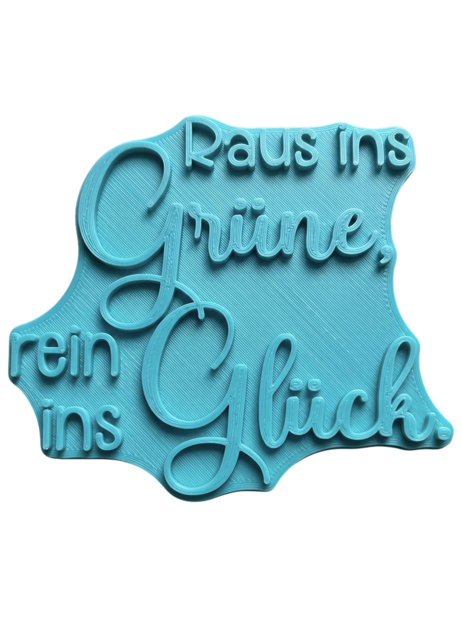 Präziser Keramikstempel des Spruchs 'Raus ins Grüne, rein ins Glück' . Filigranes Relief für Gartenkeramik, gestaltet von MinseArt.
