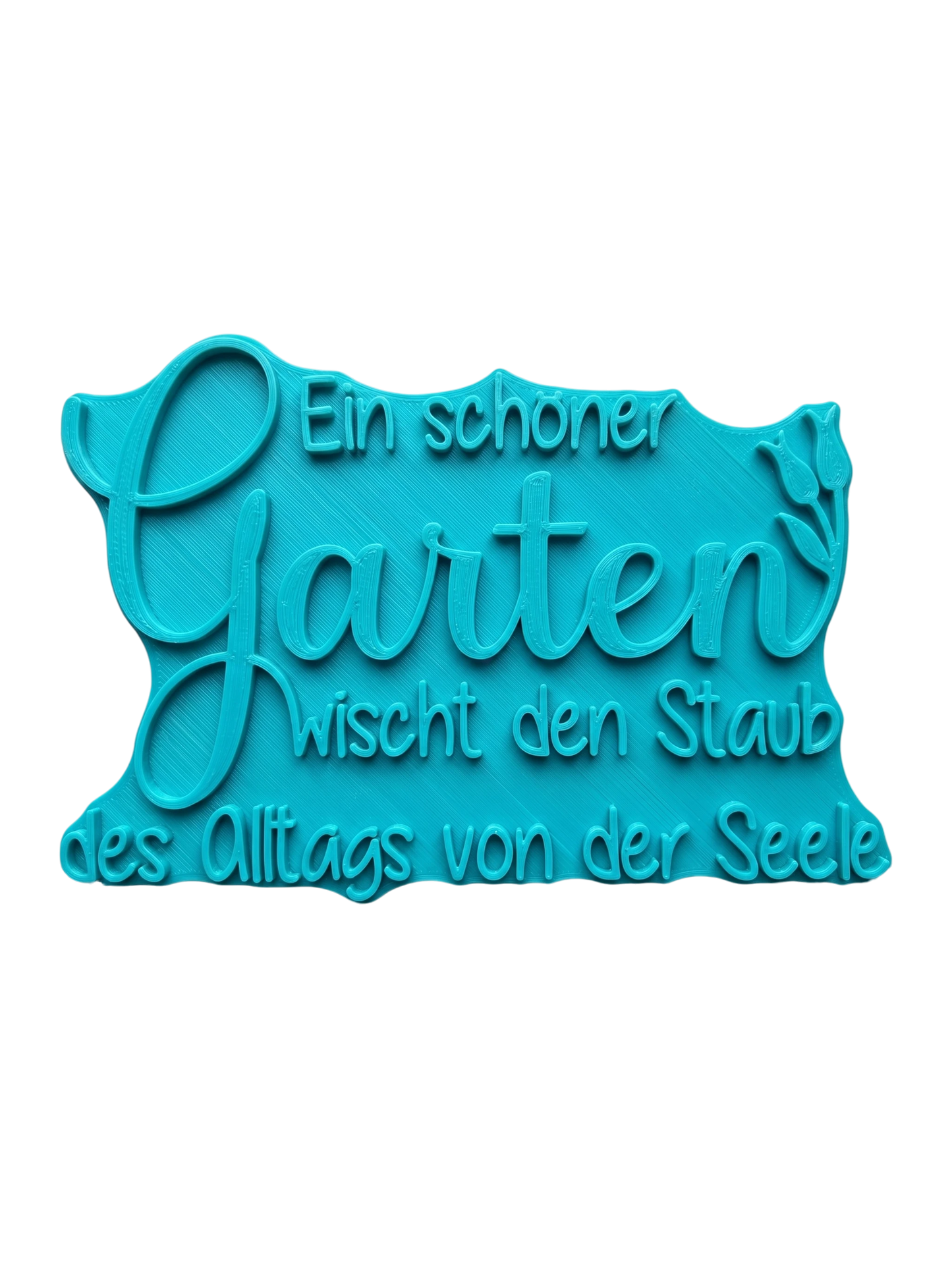 Türkisfarbener Keramikstempel für Ton mit dem Schriftzug 'Ein schöner Garten wischt den Staub des Alltags von der Seele' und einem zarten Blumenmotiv. Hochwertiges Töpferwerkzeug für detailgetreue Prägungen.