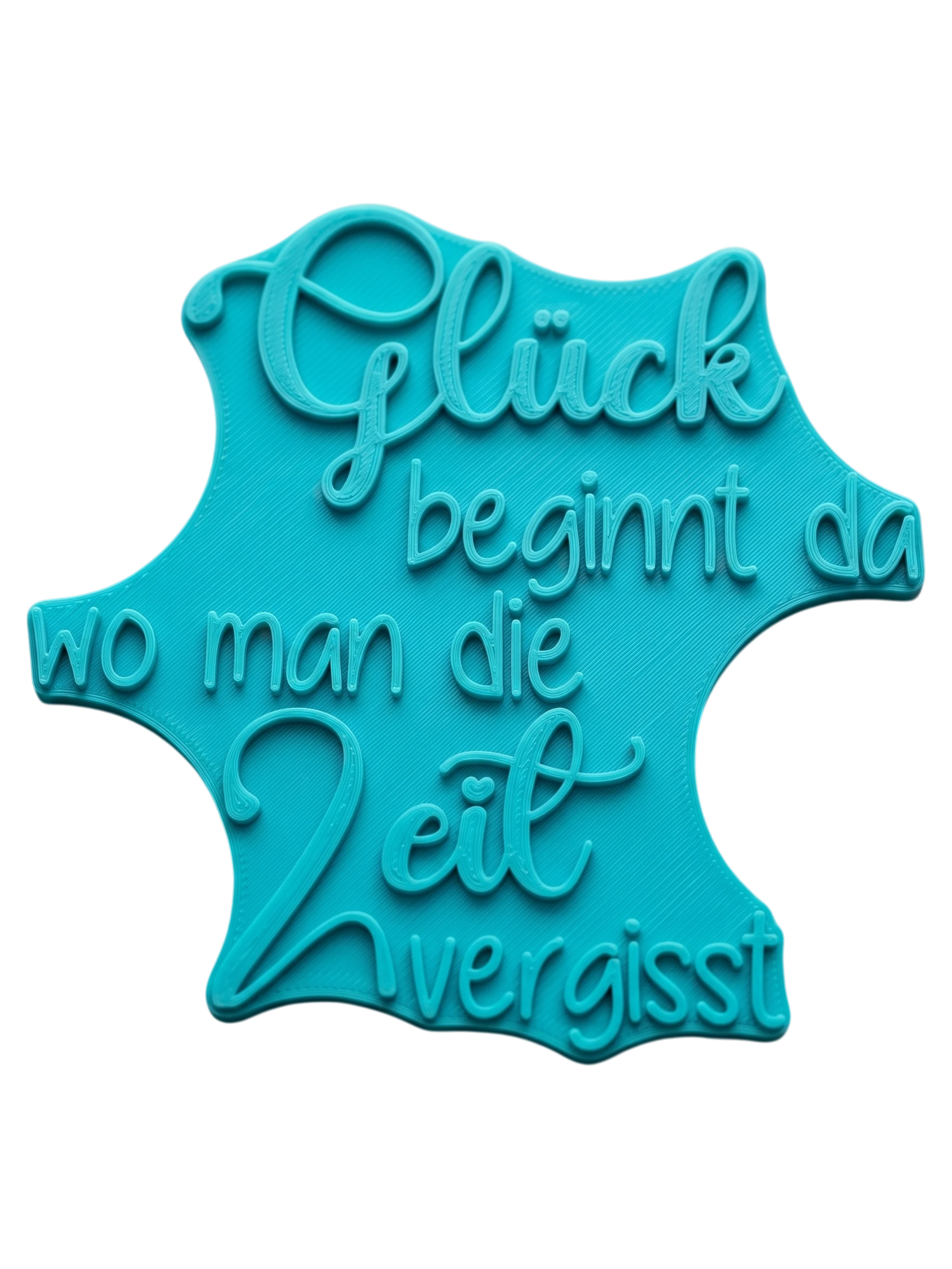 Türkisfarbener Keramikstempel für Ton mit dem Spruch 'Glück beginnt da, wo man die Zeit vergisst'. Hochwertiges Töpferzubehör für achtsame Keramikprojekte.