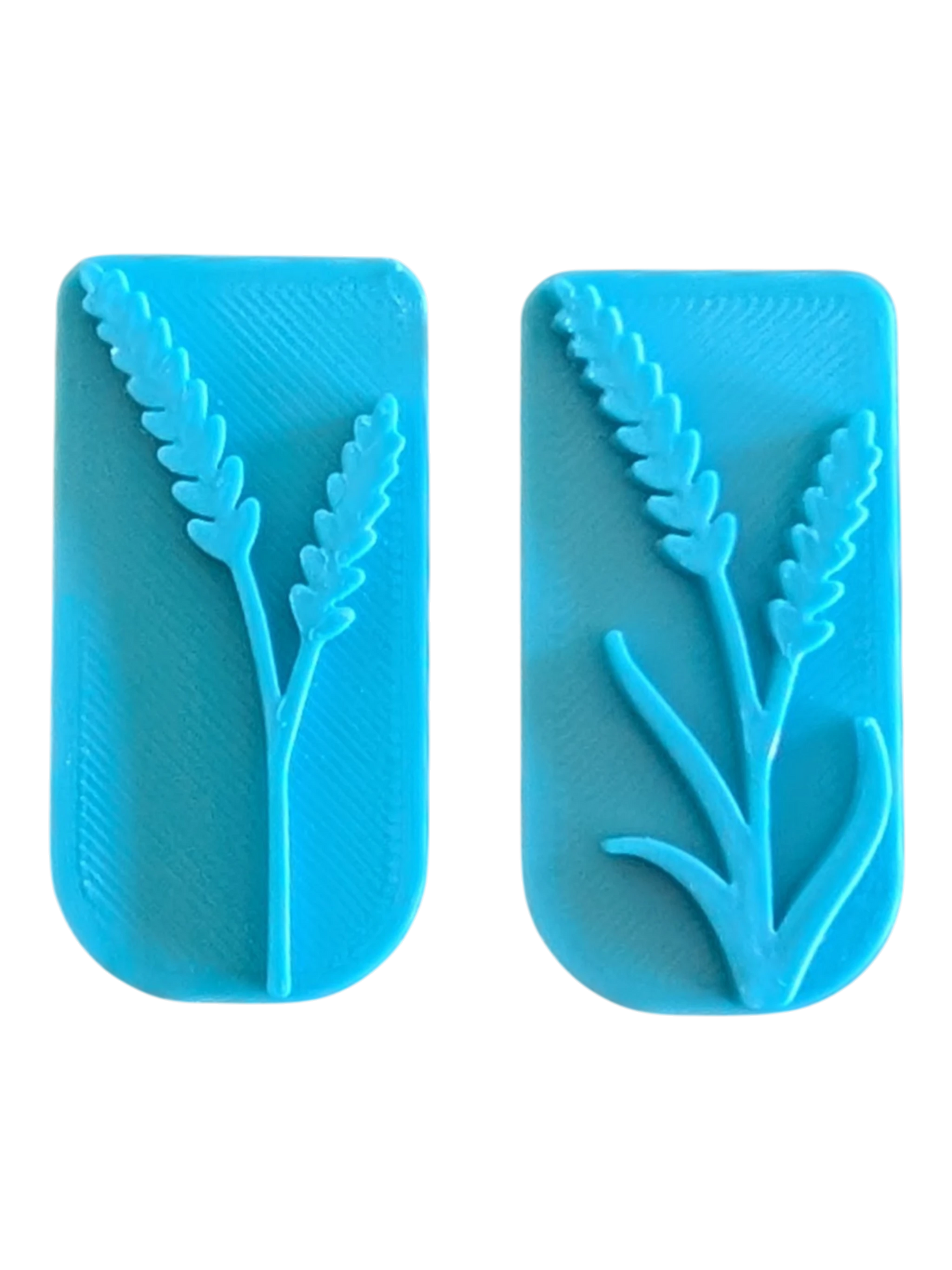 Draufsicht auf das eckige 2er-Set Keramikstempel. Die unterschiedlich dichten Pflanzenmotive lassen sich wunderbar zu natürlichen Wiesenmustern und Kränzen kombinieren.