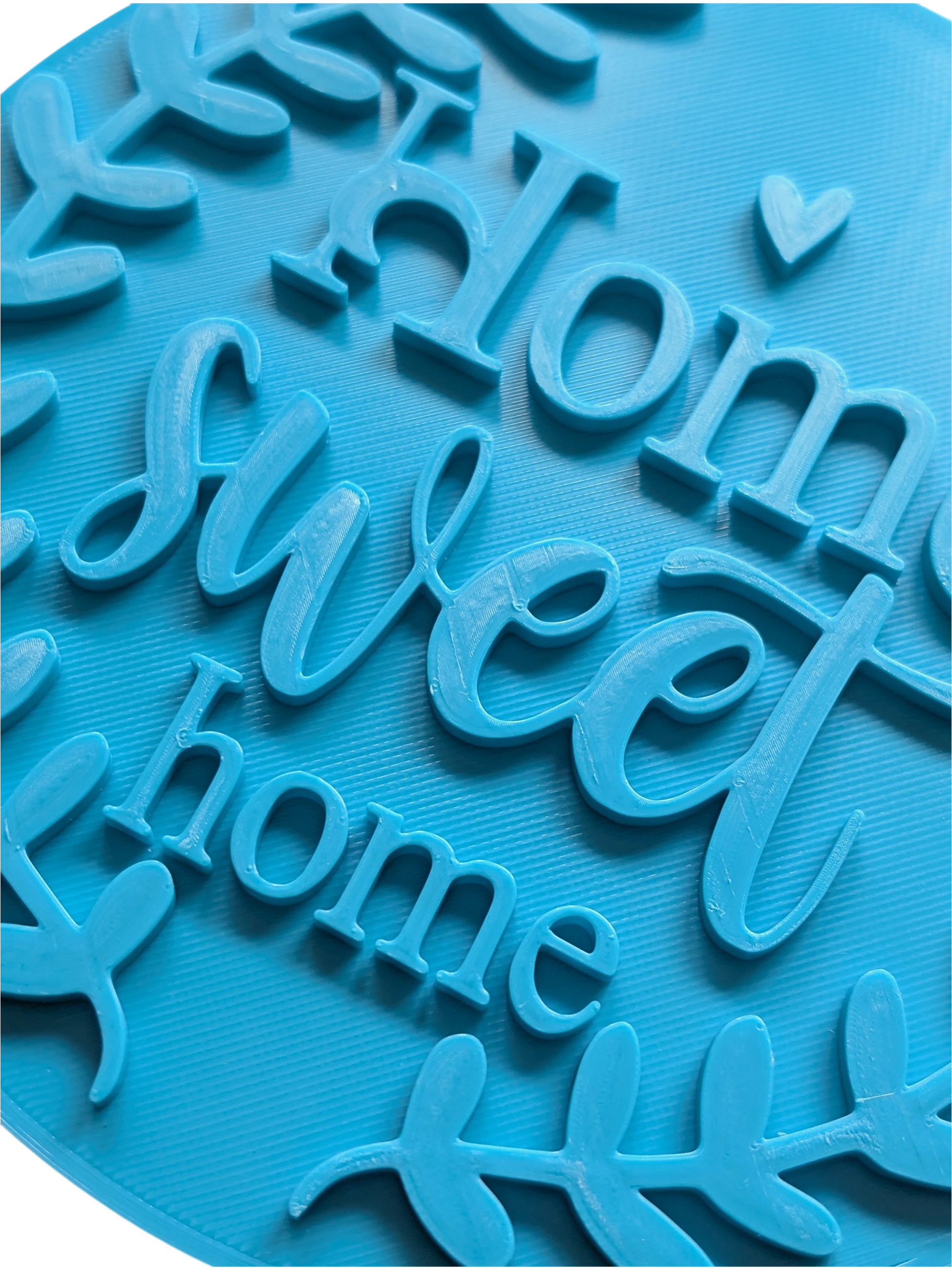 Schrägansicht des Prägestempels 'Home sweet home'. Ein hochwertiges Töpferwerkzeug für präzise Textprägungen und kreative Keramikprojekte für Zuhause.