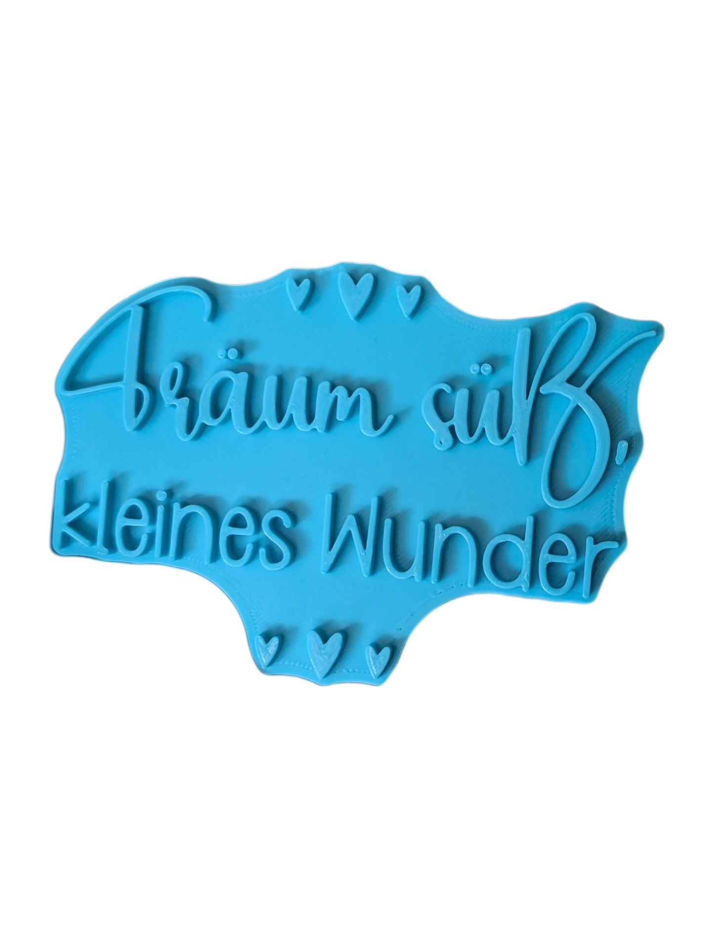 Detailaufnahme des Keramikstempels. Die filigranen Buchstaben und Herzchen sind optimal für saubere, präzise Konturen in Modelliermassen ausgeformt.