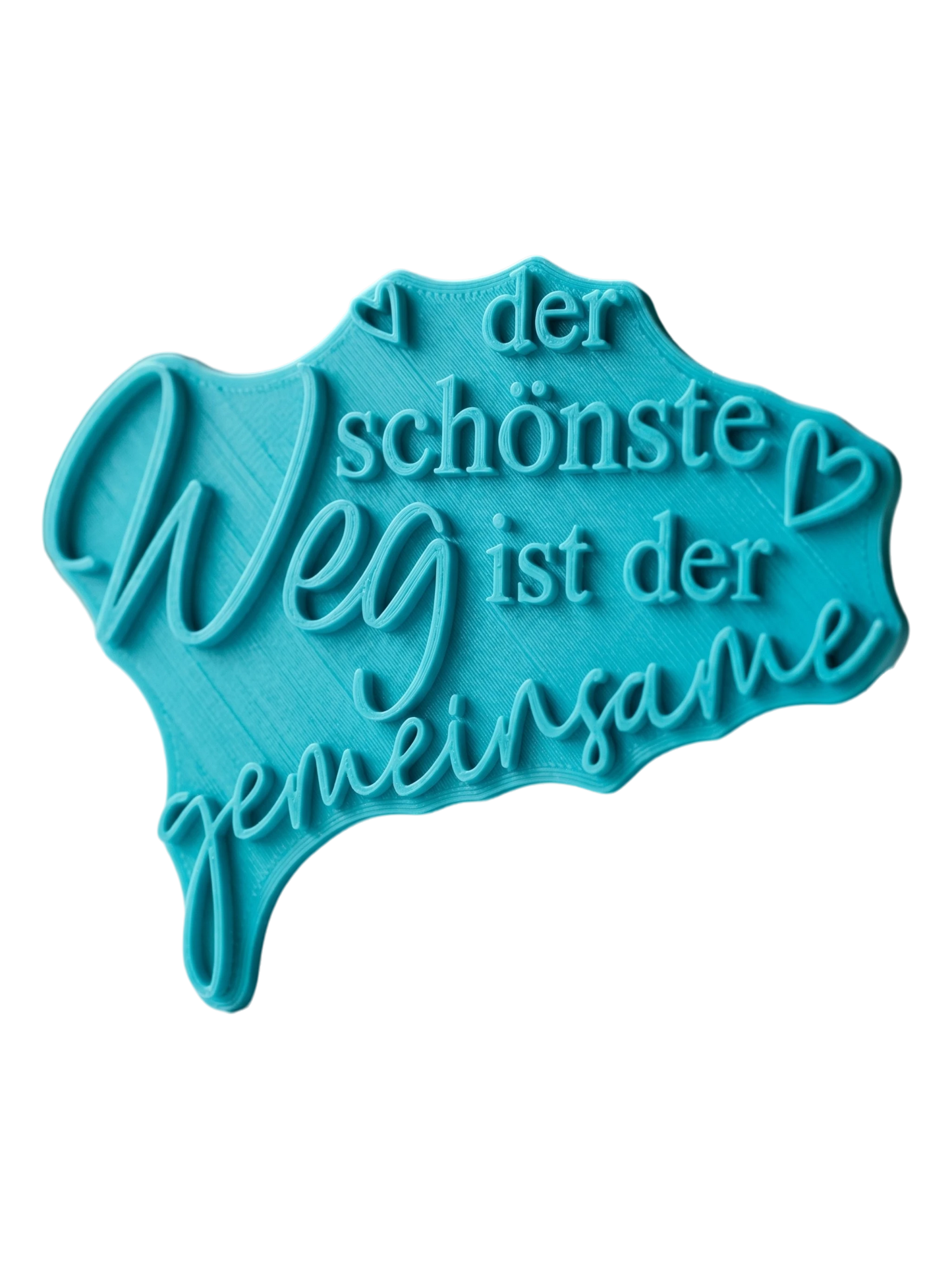 Türkisfarbener Prägestempel für Ton mit dem romantischen Spruch 'der schönste Weg ist der gemeinsame'. Ein detailreicher Tonstempel für individuelle Hochzeitsgeschenke und Andenken.
