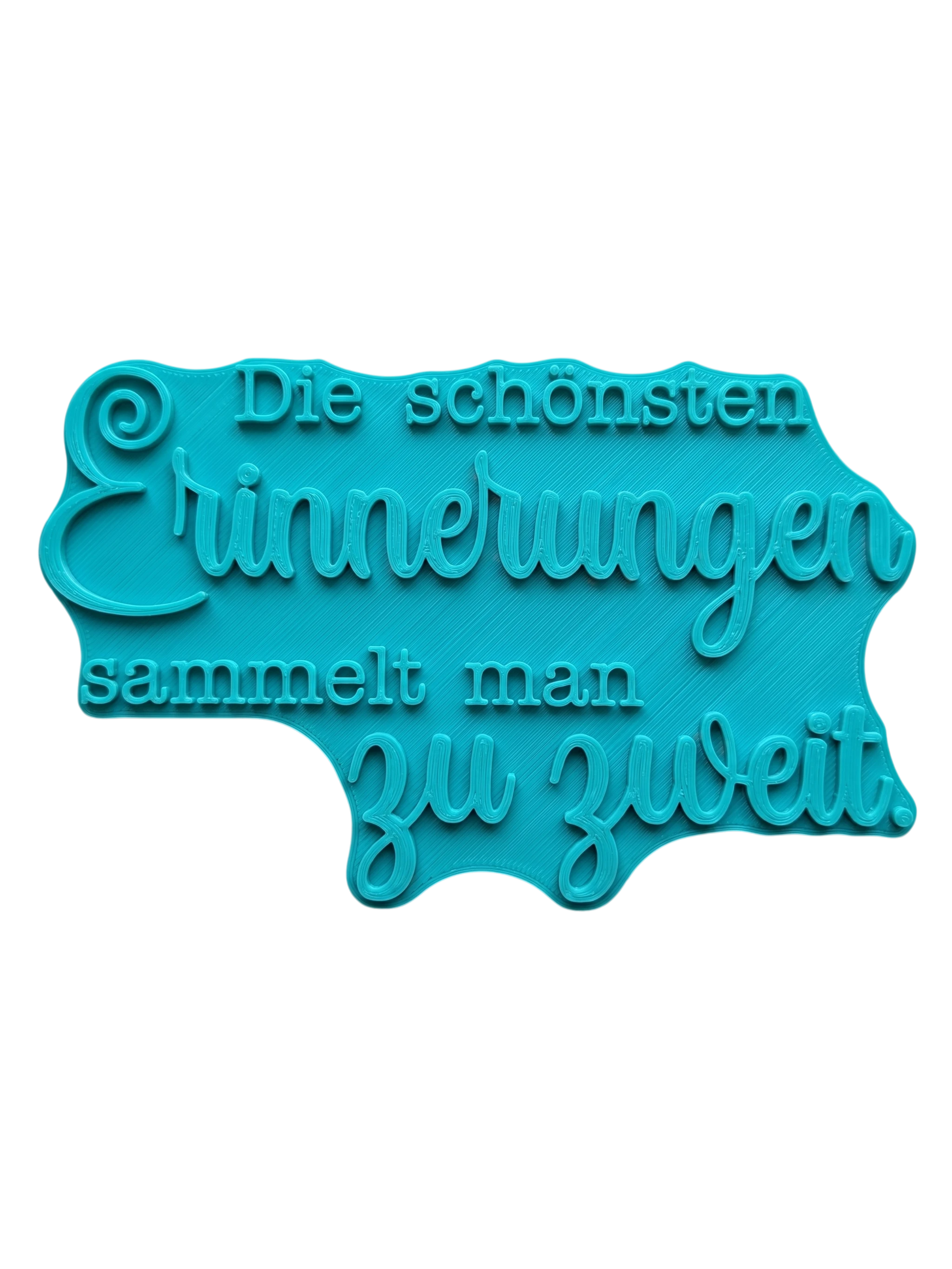 Türkisfarbener Keramikstempel für Ton mit dem Schriftzug 'Die schönsten Erinnerungen sammelt man zu zweit'. Hochwertiges und handgefertigtes Töpferwerkzeug für detailgetreue Textprägungen.