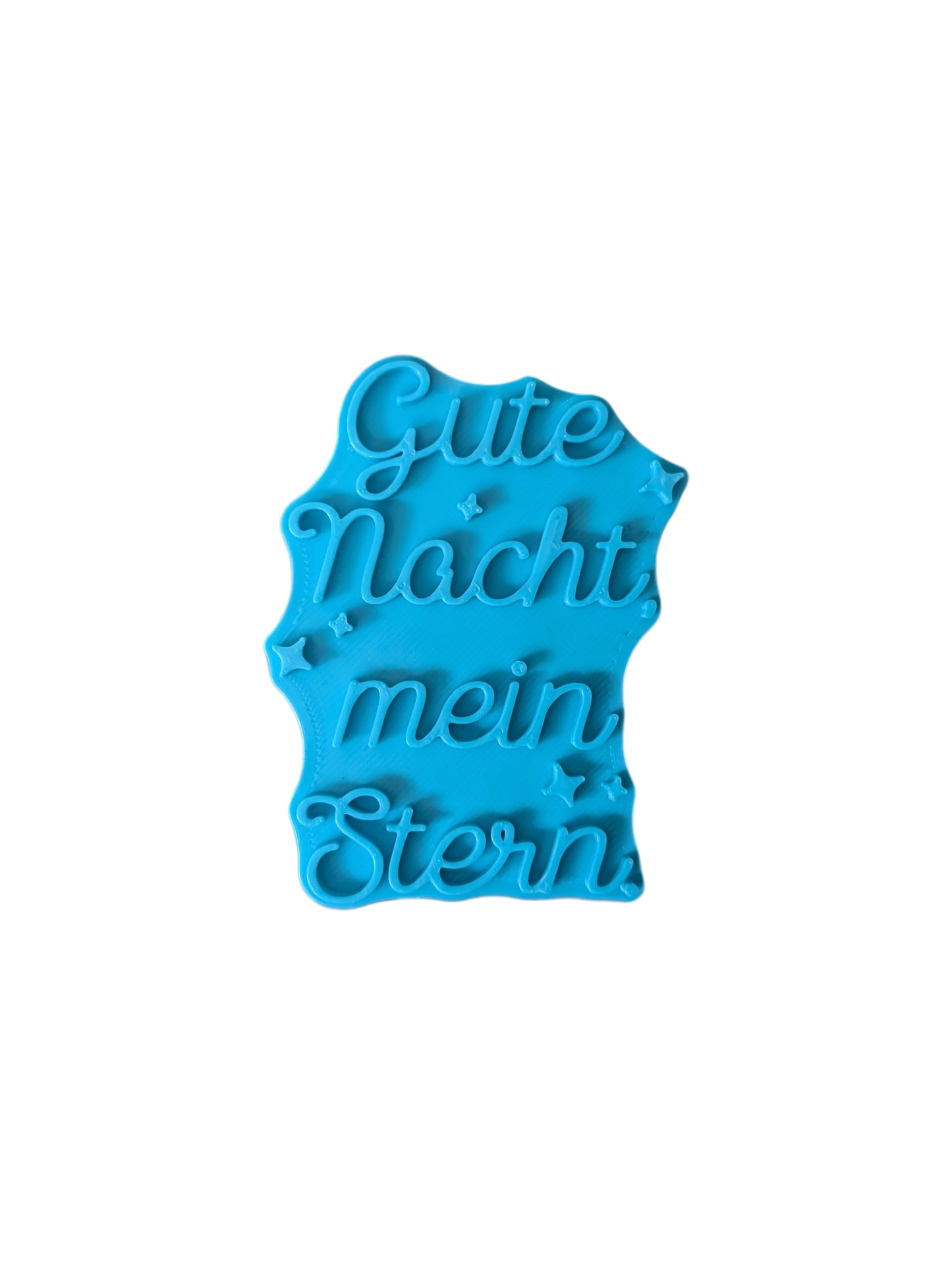 Draufsicht auf den Prägestempel für Ton mit dem Spruch 'Gute Nacht, mein Stern'. Ein detailreicher Textstempel für liebevolle Baby-Keramik und Kinderzimmer-Deko.