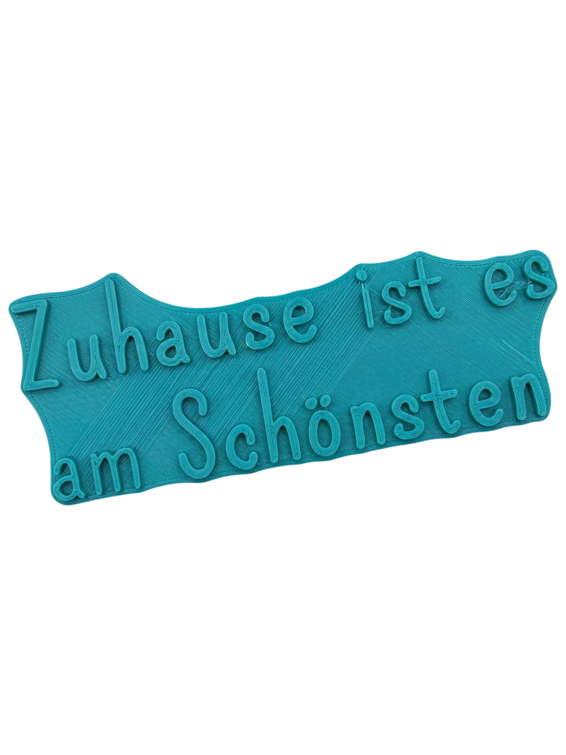 Türkisfarbener Keramikstempel Zuhause ist es am Schönsten. Hochwertiger Töpferbedarf für klare und saubere Textprägungen in Ton und lufttrocknenden Massen.