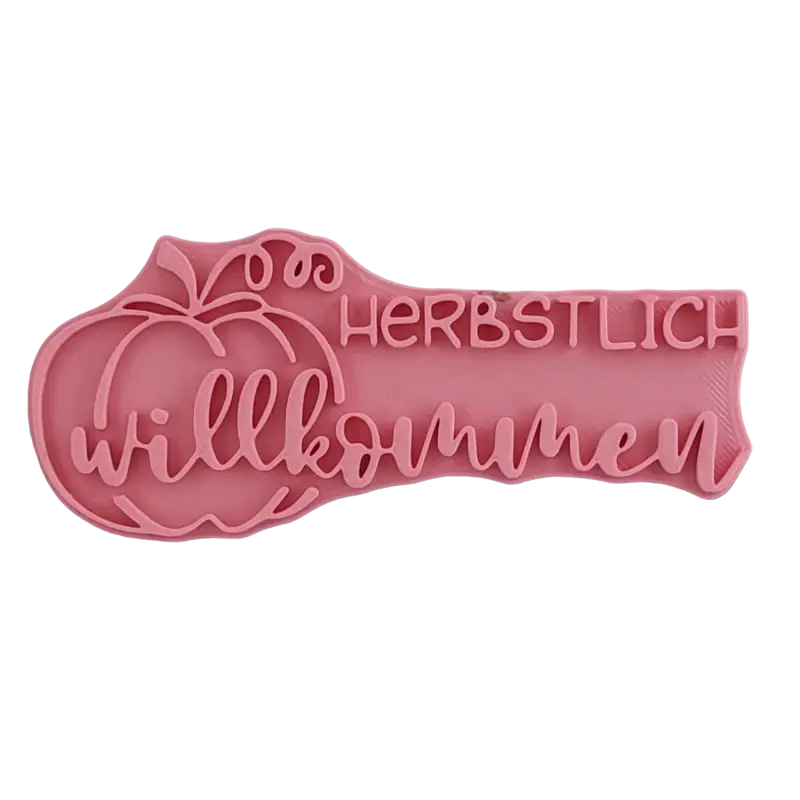 Draufsicht auf den Prägestempel für Ton mit dem Schriftzug 'Herbstlich willkommen' und einem Kürbis. Hochwertiges Töpferwerkzeug für detailreiche herbstliche Keramikdekoration. Töpferstempel - Spruchstempel