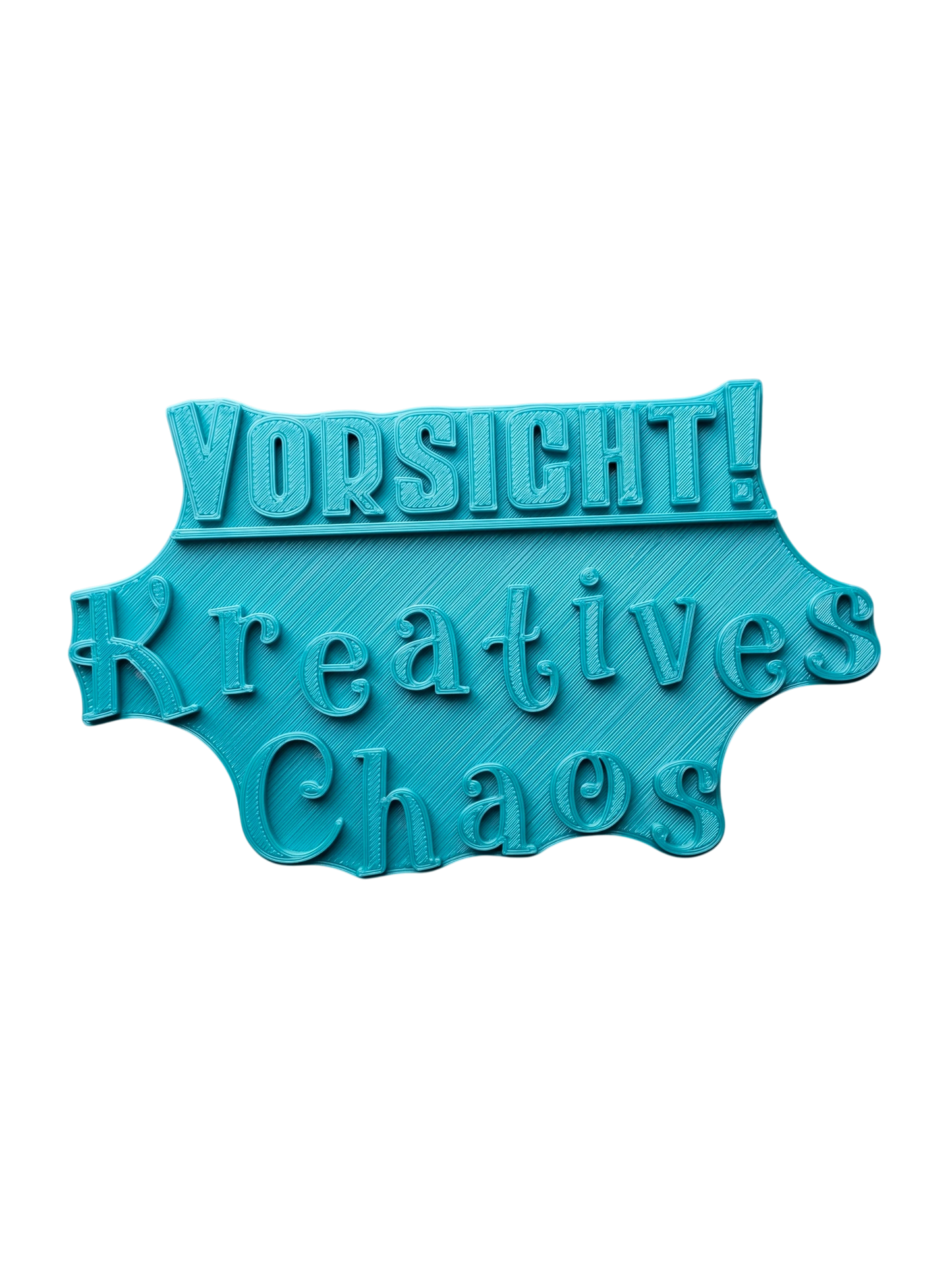 Türkisfarbener Keramikstempel für Ton mit dem Schriftzug 'Vorsicht! Kreatives Chaos'. Hochwertiges Töpferwerkzeug für originelle Atelier-Deko.